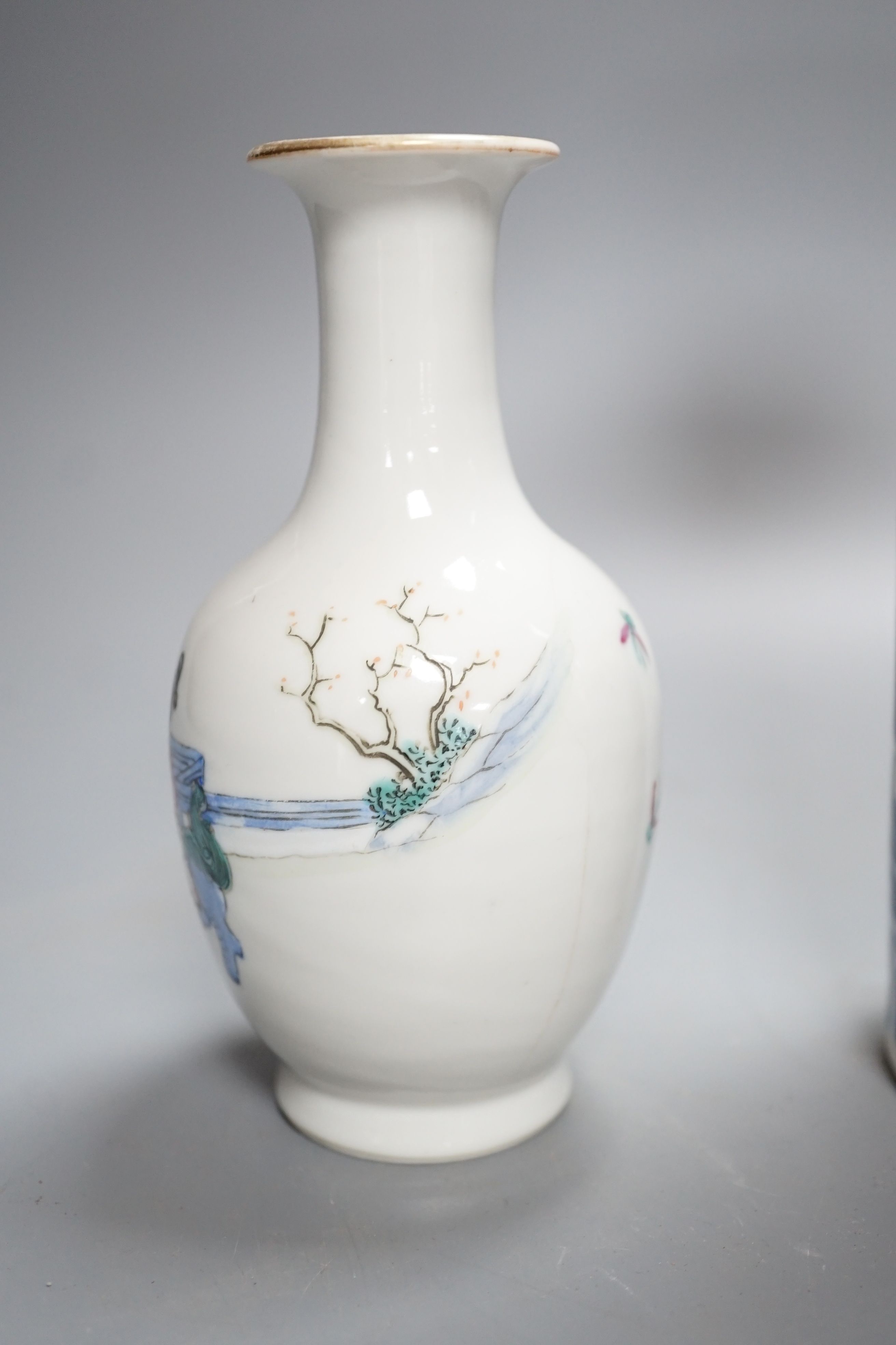 A Chinese blue and white sleeve vase and small famille rose vase, sleeve vase 25 cms high.